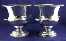 A pair of 20th century silver plated two handled campana shaped wine coolers and liners, with