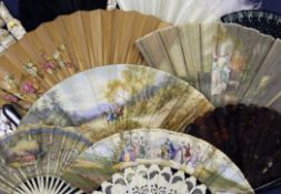 A collection of seven early 20th century fans made for the American market, including mother of