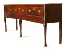 A GEORGE III OAK DRESSER, 2ND HALF 18TH CENTURY, the moulded top above three lip-moulded crossbanded
