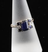 A 1930`s Art Deco sapphire and diamond cluster dress ring, of rectangular form, the central