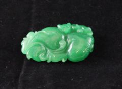 A Chinese green stone pendant, carved as a gourd and a tree shrew 2in. (4.8cm)