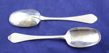 A pair of Queen Anne Brittania standard silver rat tail dog nose spoons, with prick dot engraved