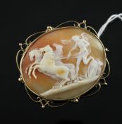 A 1970`s 9ct gold mounted oval cameo brooch, carved with angel and rearing horses, 2in.