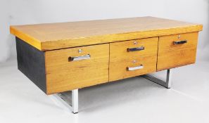 A 20th century Merrow Associates low teak office cabinet, fitted four drawers with chrome handles