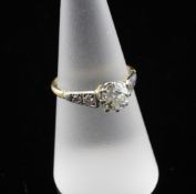 A 1920`s 18ct gold and platinum, solitaire diamond ring, with old cut stone weighing approximately