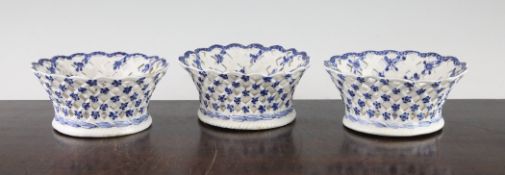 A set of three Bow baskets, c.1765, each pierced and painted in blue with flowers to the interior,