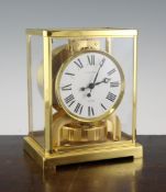 A Jaeger Le Coultre Atmos V clock, 8.75in. A Jaeger Le Coultre Atmos V clock, with lacquered brass