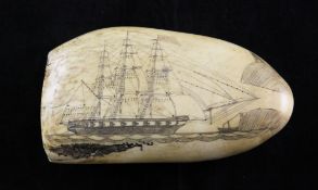 A 19th century scrimshaw whales tooth, 5.5in. A 19th century scrimshaw whales tooth, one side