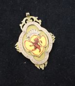 A George V 9ct gold and enamel Scottish Junior Football League medal, 1.75in. A George V 9ct gold