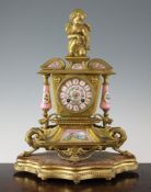 A 19th century French gilt metal and porcelain mantel clock, 15in. A 19th century French gilt