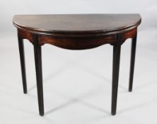 A George III mahogany demi-lune tea table, W.3ft 6in. A George III mahogany demi-lune tea table,