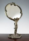 An Art Nouveau painted pewter mirror, overall 18in. An Art Nouveau painted pewter mirror, the oval