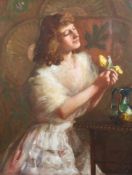 Thomas Edwin Mostyn (1864-1930) Young woman holding yellow tulips, 36 x 28in. Thomas Edwin Mostyn (