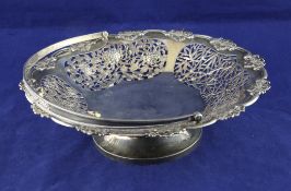 A late 19th/early 20th century Chinese silver cake basket by Wang Hing, Hong Kong, 19.5 oz. A late