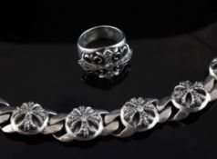 A silver and diamond set Chrome Hearts bracelet and similar dress ring, A silver and diamond set