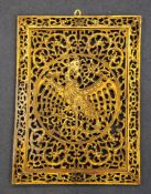 A Chinese gilded wood panel of a phoenix, late 19th / early 20th century, 19.5 x 14.5in. (49.5 x