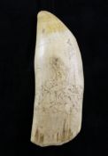 A 19th century scrimshaw whales tooth, 8in. A 19th century scrimshaw whales tooth, depicting a