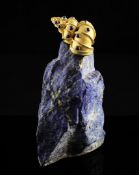An early 1970`s Andrew Grima Ltd 18ct gold and lapis lazuli set model of a conical sea shell,