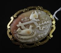 A Victorian gold mounted oval cameo brooch, 2.25in. A Victorian gold mounted oval cameo brooch,