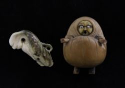 A Japanese Kobe wood figure of Daruma and a Japanese shell netsuke, early 20th century, 2.5in. and