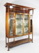 An Art Nouveau mahogany display cabinet, W.5ft 2in. An Art Nouveau mahogany display cabinet, with