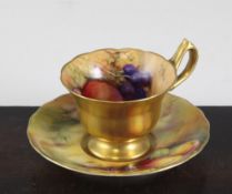 A Royal Worcester cabinet cup and saucer, date code for 1927, 4.6in. A Royal Worcester cabinet cup