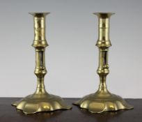 A pair of 18th century brass ejector candlesticks, 7.5in. A pair of 18th century brass ejector