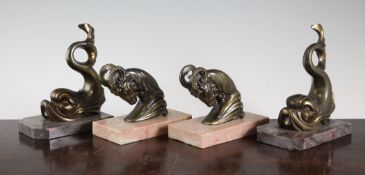 Attributed to Pierre Laurel. Two pairs of patinated metal Art Deco bookends, 5in. Attributed to