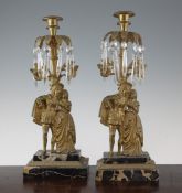 A pair of glass lustre and brass candle sconces, 15.5in. A pair of glass lustre and brass candle