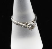 An 18ct white gold and solitaire diamond ring, size N. An 18ct white gold and solitaire diamond