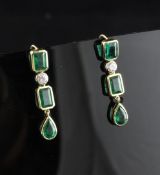 A pair of gold, emerald and diamond drop earrings, 1in. A pair of gold, emerald and diamond drop