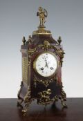 An early 20th century French ormolu mounted tortoiseshell mantel clock, 16.5in. An early 20th