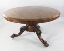A Victorian mahogany circular top tilt table, W.4ft 6in. A Victorian mahogany circular top tilt