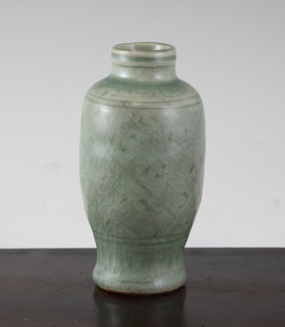 A Chinese Longquan celadon small baluster vase, Ming dynasty, 15th/16th century, 5.4in. A Chinese