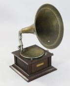 A Monarch oak cased gramophone A Monarch oak cased gramophone, by the Gramophone and Typewriter