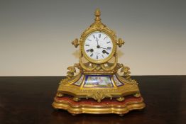 A French porcelain mounted mantel clock, c.1870, 12.25in. A 19th French ormolu and Sevres style