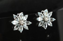A pair of 1960`s Italian 18ct white gold, aquamarine and diamond set ear clips, retailed by