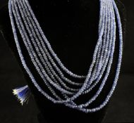 A continental multi-strand rough cut sapphire necklace, 34in. A continental multi-strand rough cut