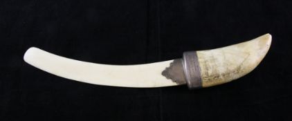 A Victorian scrimshaw ivory and silver mounted paperknife, 18.5in. A Victorian scrimshaw ivory and