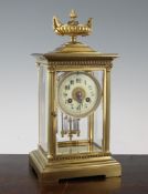 An early 20th century French ormolu four glass mantel clock, 12in. An early 20th century French