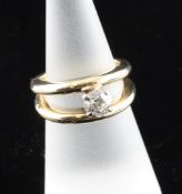 A 14ct gold and solitaire diamond ring, size K. A 14ct gold and solitaire diamond ring, with open