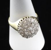 An 18ct gold and platinum pave diamond set dress ring, size S. An 18ct gold and platinum pave