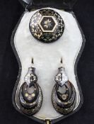 A late Victorian cased suite of tortoiseshell, gold and silver pique jewellery, brooch 1.25in. A