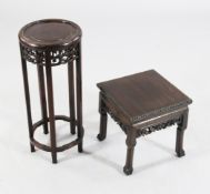 Two Chinese stands A 20th century Chinese rosewood circular case stand, together with another