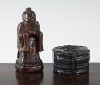 A Chinese rosewood box and a figure A Chinese rosewood hexagonal box and cover, 19th century, carved