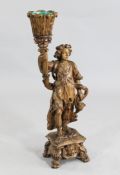 An Italian carved pine figural torchere, probably 18th century H.2ft 8in. An Italian carved pine
