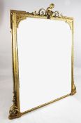 A late Victorian gilt framed overmantel mirror, W.4ft A late Victorian gilt framed overmantel
