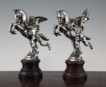 Two 20th century silvered metal car mascots, both 9.5in. Two 20th century silvered metal car