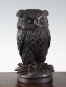 A Black Forest carved owl tobacco jar, 10in., some damage A Black Forest carved owl tobacco jar, the