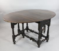 An 18th century oak gateleg table, W.5ft extended An 18th century oak gateleg table, with turned
